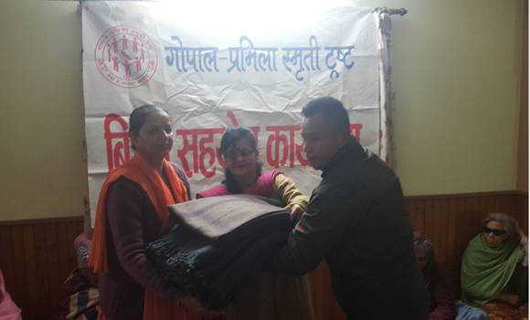 Ms Gita Chhetri, Chairperson of the Gopal-Pramila Trust, distributed 20 blankets (Total cost Rs 10,000) and 20 pairs of slippers (Total Cost Rs 3000) to the elderly women of the 'Divyasewa Niketan Briddhashram'.