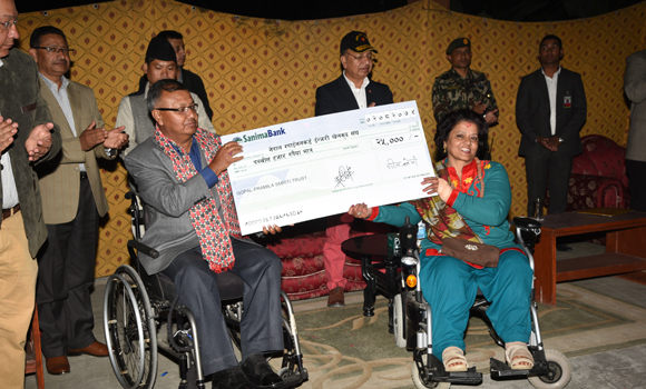 Maj Gen Ramindra Chhetri, Founder Member of Gopal-Pramila Memorial Trust, handed over a cheque of NPR 25,000 to the Chairperson of Nepal Spinal Injury Sports Association on November 18, 2017.